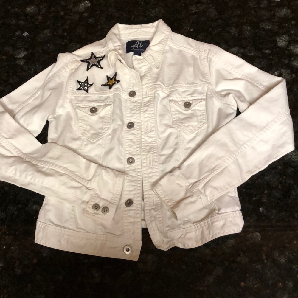 Cream denim jacket with stars